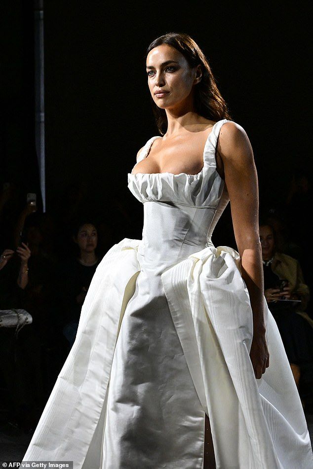 irina shayk wears a busty corset gown for vivienne westwoods pfw show